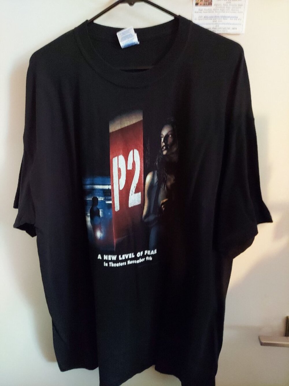 P2, a Blockbuster promo, M & O black t-shirt, short sleeves, unisex, Size XL